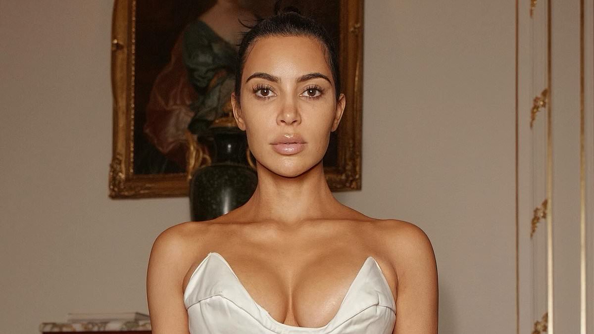 Kim Kardashian's fans go wild as she showcases her natural beauty with little makeup while posing in a plunging corset bodysuit