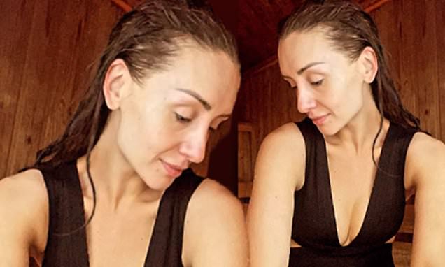 Catherine Tyldesley flashes her cleavage in a plunging brown swimsuit