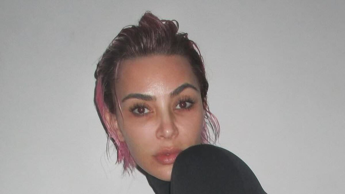 Kim Kardashian unveils millennial pink bob in gritty photo shoot... after bleach blonde hair left her looking like Kanye West's new wife Bianca Censori