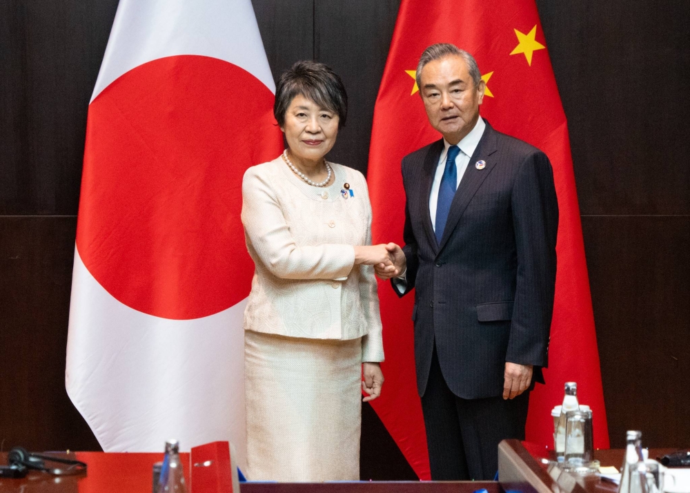 As foreign ministers meet, China says relations with Japan at 'critical stage'