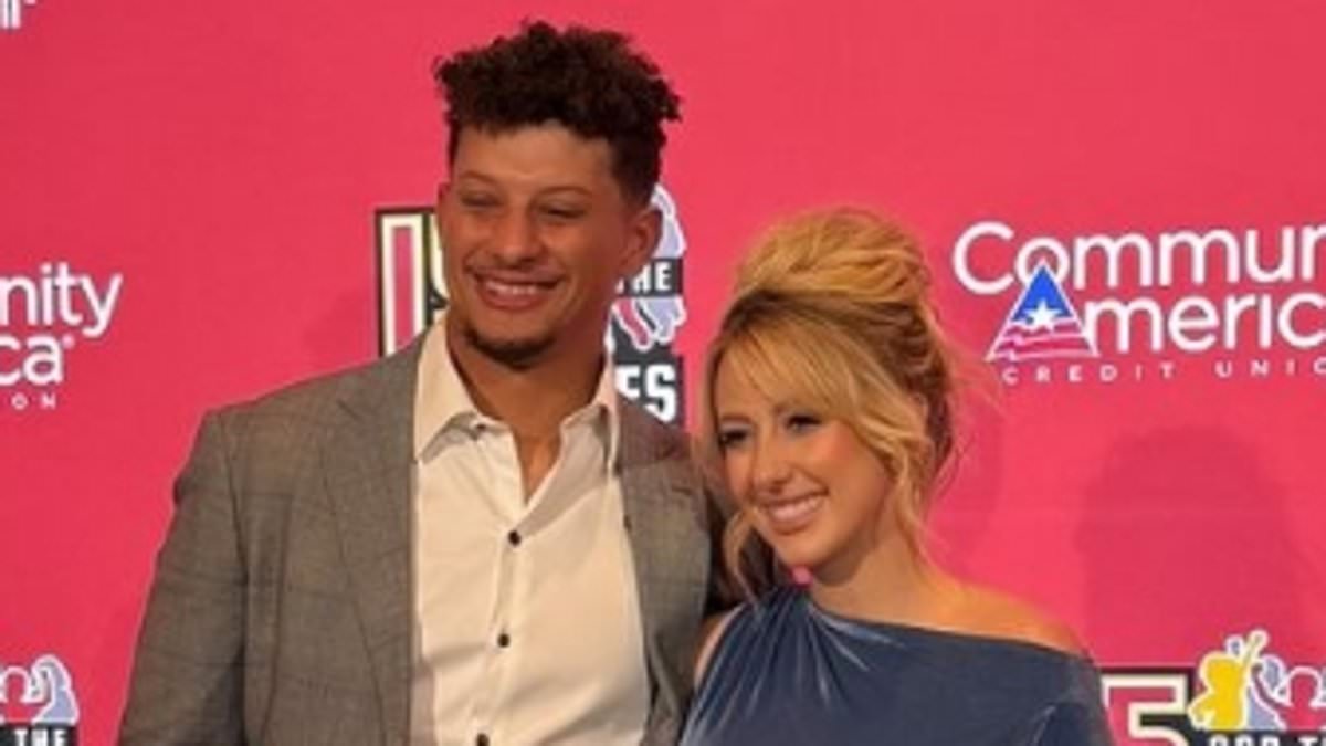 Radiant Brittany Mahomes holds her baby bump on charity gala red carpet as she poses with husband Patrick