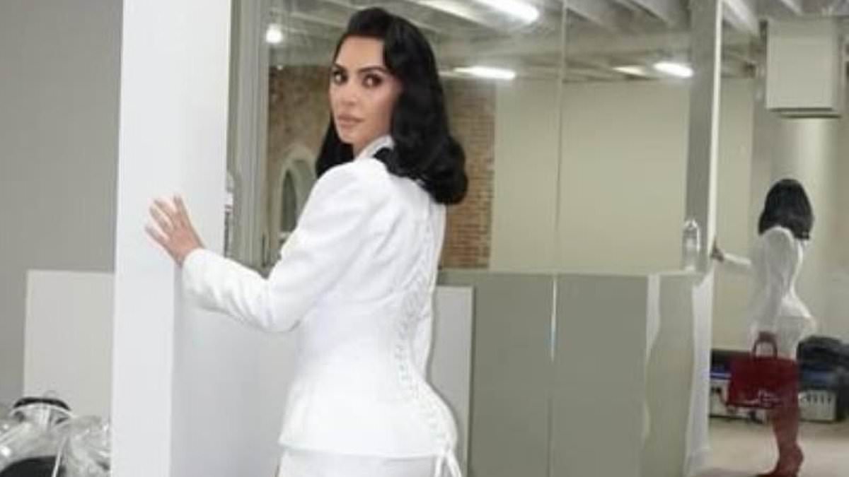 Kim Kardashian accused of photoshop fail as her famous derriere looks different in mirror reflection