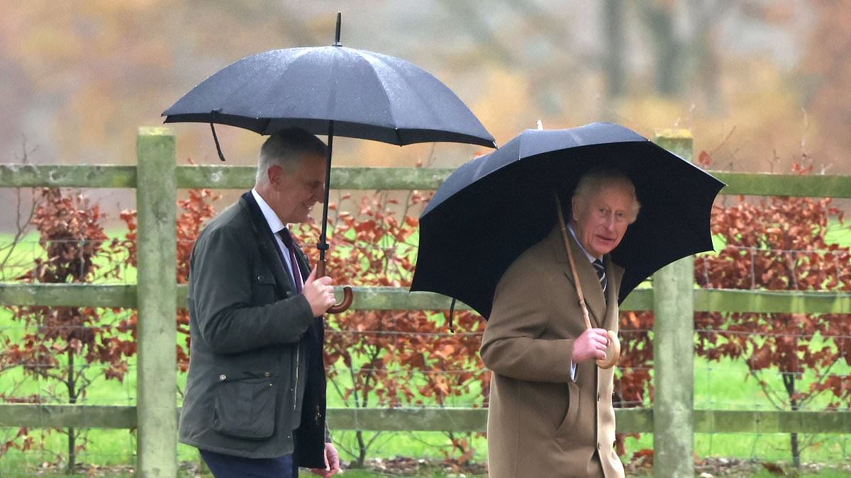 King Charles shields himself from the rain with an umbrella as he attends Sunday morning service at Sandringham