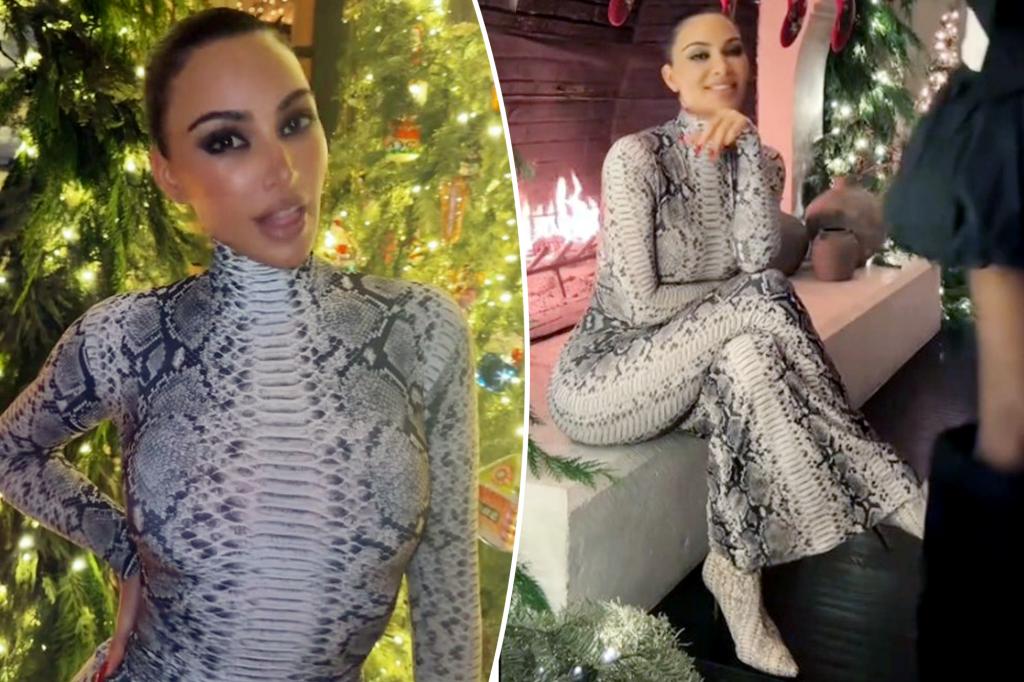 Kim Kardashian wears skin-tight snakeskin dress to Christmas Eve...