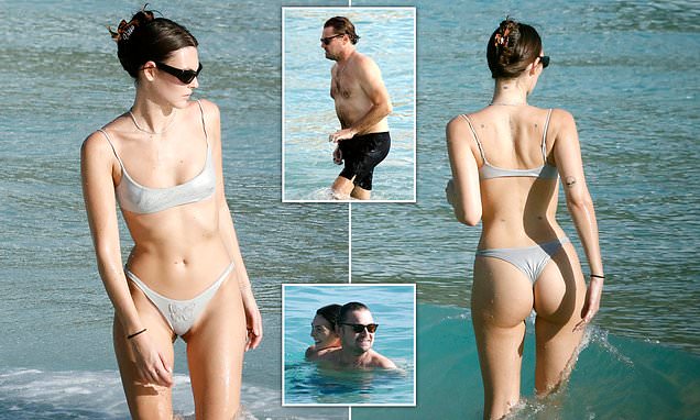 Leonardo DiCaprio beams as girlfriend Vittoria Ceretti flaunts figure