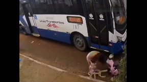 Bus driver hits mother walking with kid in stroller (video)