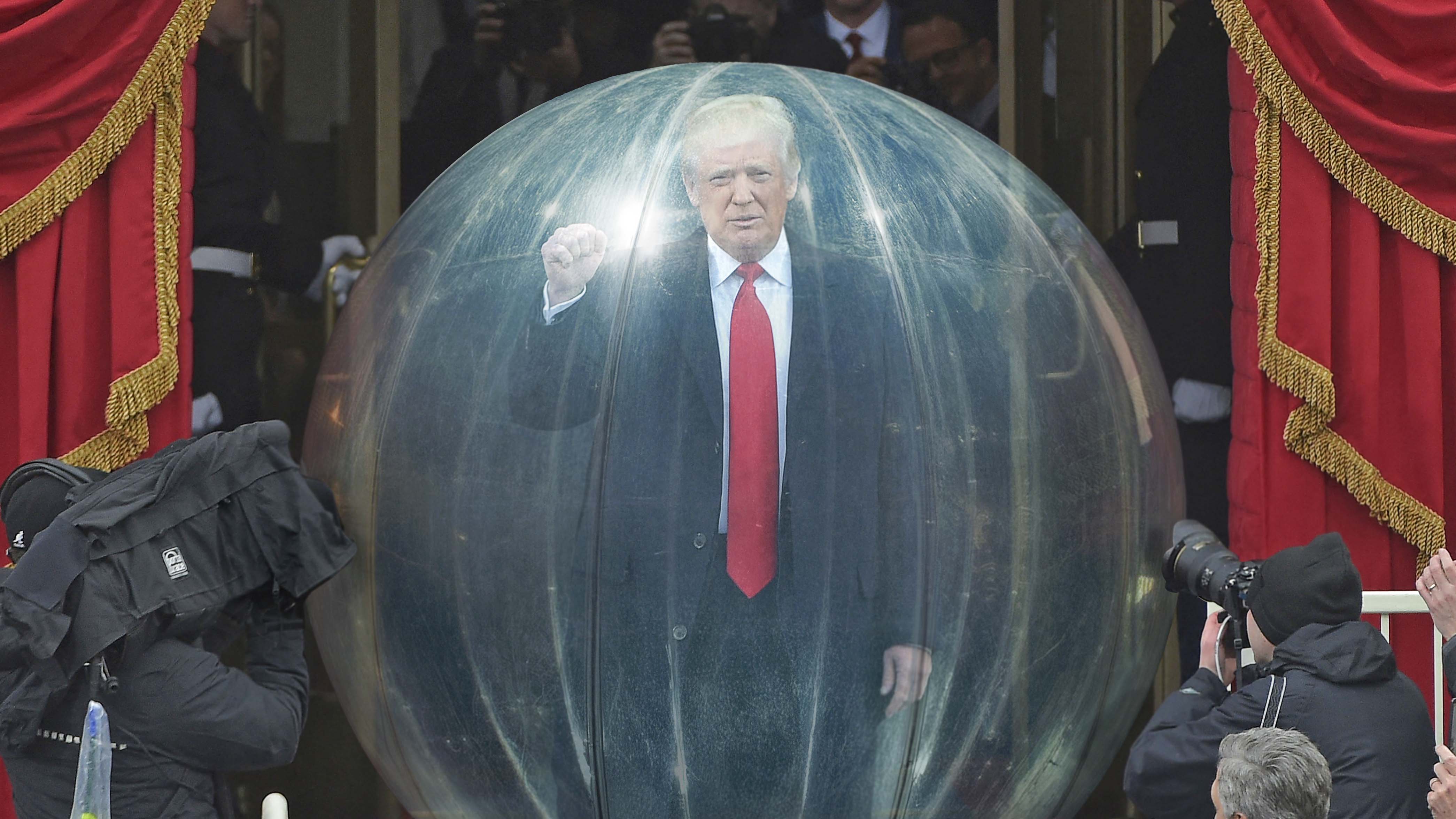 Trump Rolls Onto Capitol Steps In Bulletproof Sphere