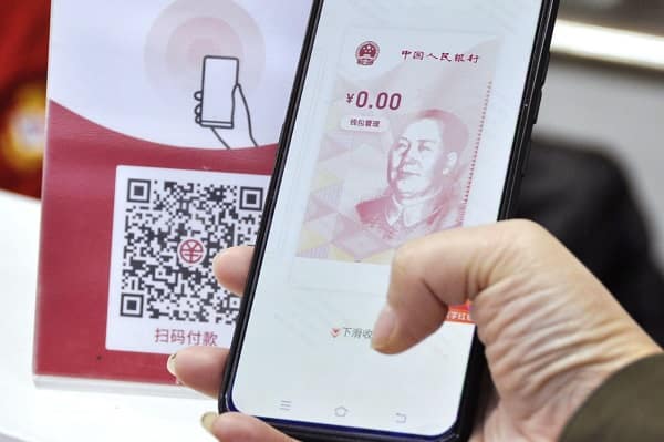 Yuan holds ground, services PMI key to next move