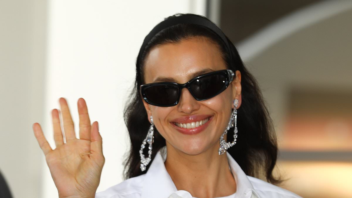 Irina Shayk opts for a conservative white skirt as Russian supermodel arrives in France ahead of red carpet crackdown at the 78th annual Cannes Film Festival