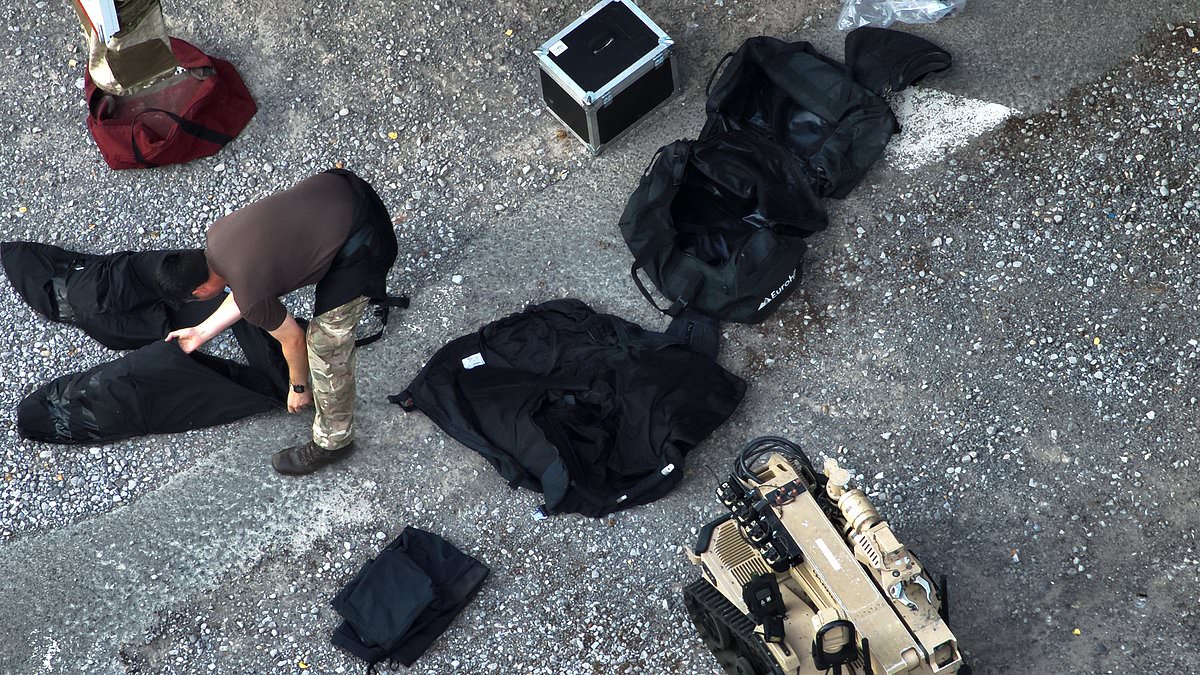 Police find at least NINE suspicious devices after shooting plumber