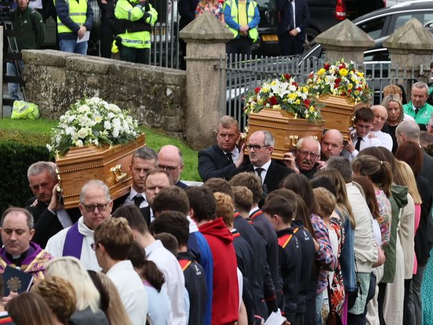 Mourners line the street at service for mum and children killed in Fermanagh shooting
