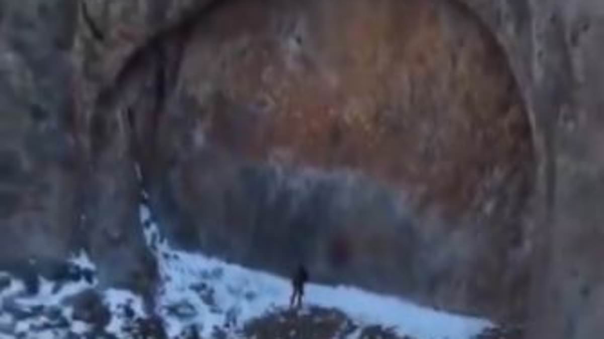 Explorers discover giant doorway hidden in the mountains and people are convinced it's 'ancient aliens'