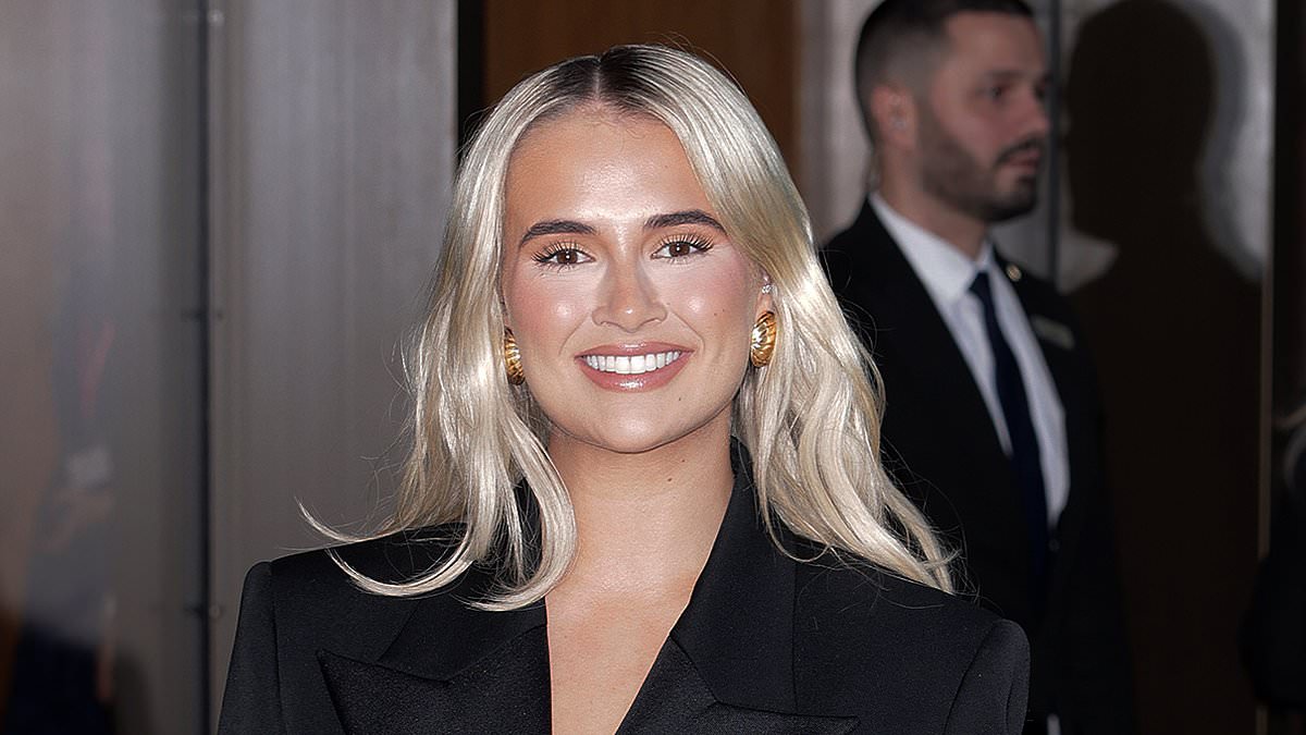 Molly-Mae Hague looks chic in a black suit as she rubs shoulders with Prince Harry at the star-studded WellChild  Awards