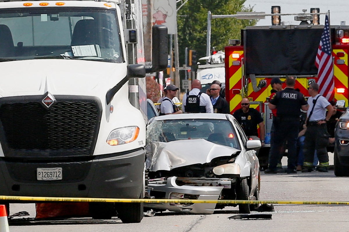 ICE agent shoots dead man who tried to run him over during operation ‘Midway Blitz’