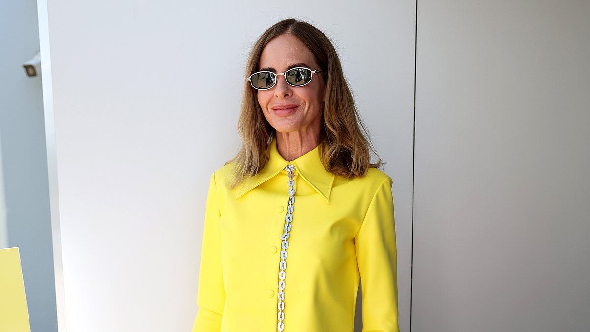 Trinny Woodall, 61, channels her inner Freddie Mercury on Sydney trip