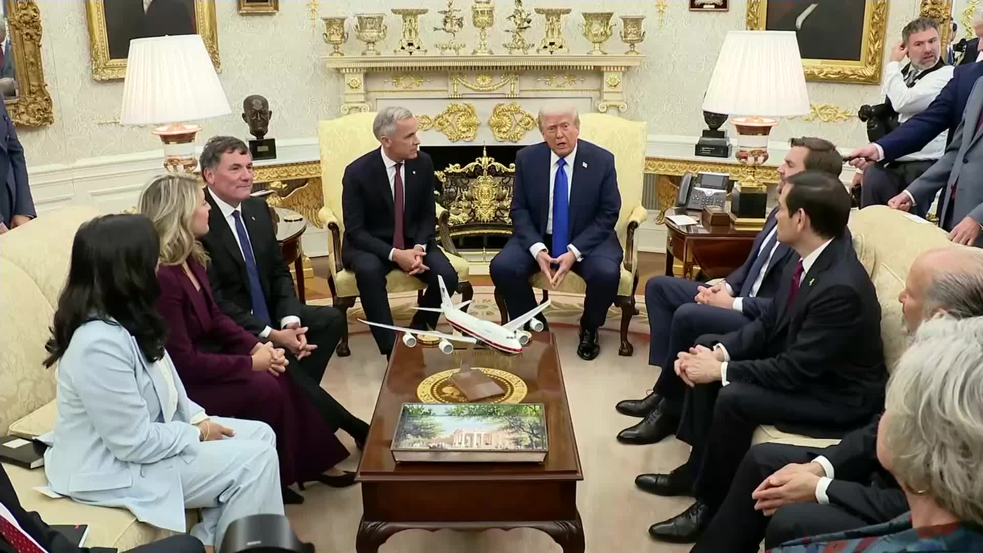 President Trump heaped praise on Canadian Prime Minister Mark Carney during an Oval Office meeting Tuesday, declaring the two leaders &quot;have great love for each other.&quot;   &quot;We've come a long way over the last few months, actually, in terms of that relationship,&quot; the president said, calling the prime minister &quot;a world-class leader&quot; and a tough negotiator.   The Canadian PM came to Washington with the goal of striking a deal to lower the steep tariffs President Trump slapped on his country's second-largest trading partner, including 50% levies on steel and aluminum.   &quot;I think they're going to walk away very happy,&quot; President Trump said, but noted the two countries have &quot;natural conflict&quot; when i