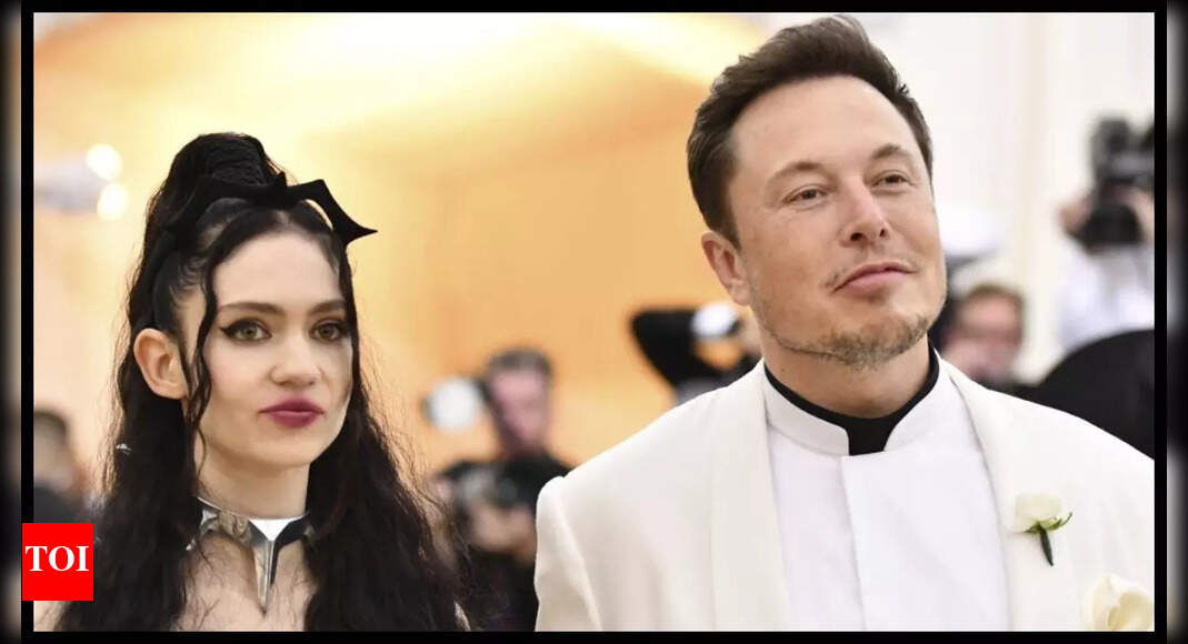 Elon Musk's ex-girlfriend Grimes faces backlash for adding 'Charlie Kirk' to album cover; netizens question meme coin | - The Times of India