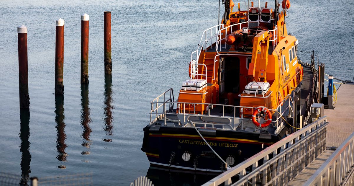 Four fishermen rescued off Cork coast after trawler hit post