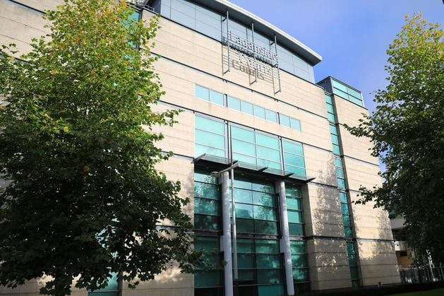 Racial slurs shouted at tourists during Belfast city centre attack, court told