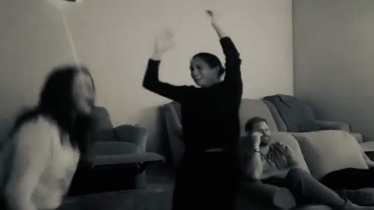 Meghan celebrates Dodgers' win alongside an unimpressed Prince Harry