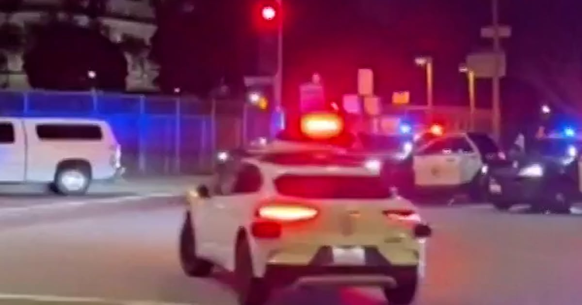 Waymo taxi drives into active police scene