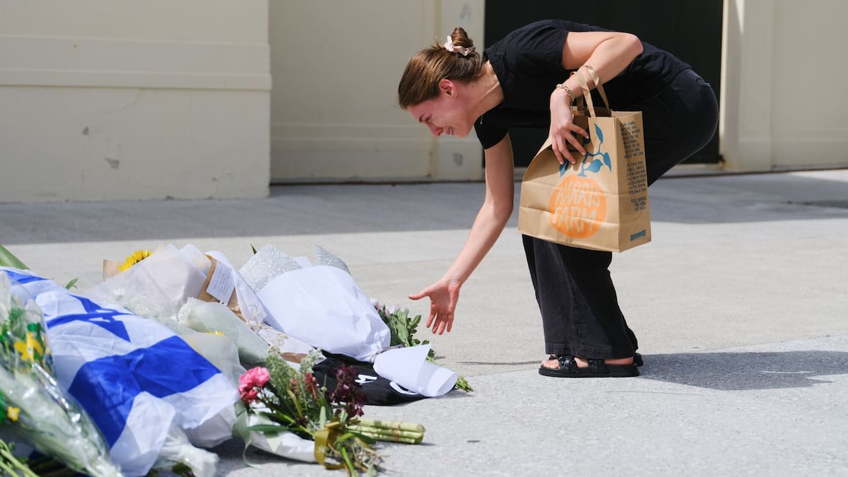 Surfboards became makeshift stretchers as people tried to help bleeding Bondi victims