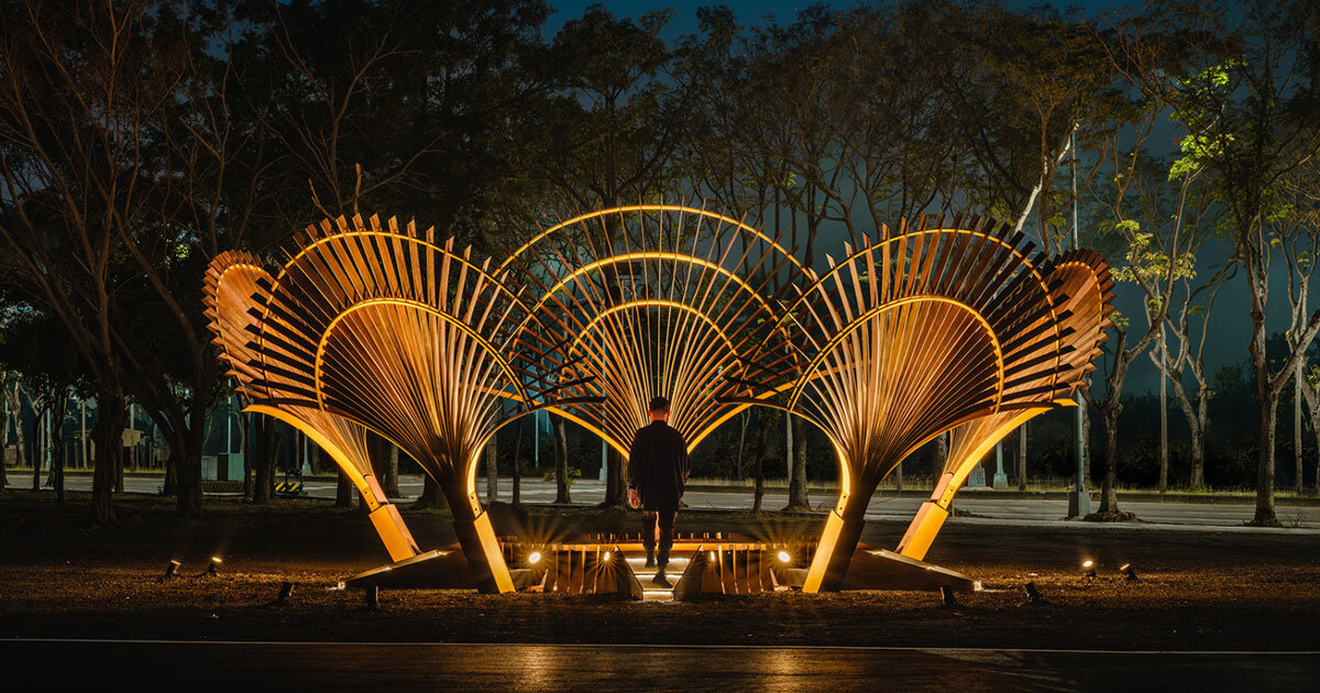 bent wooden beams fan like illuminating petals in cheng tsung feng’s installation in taiwan