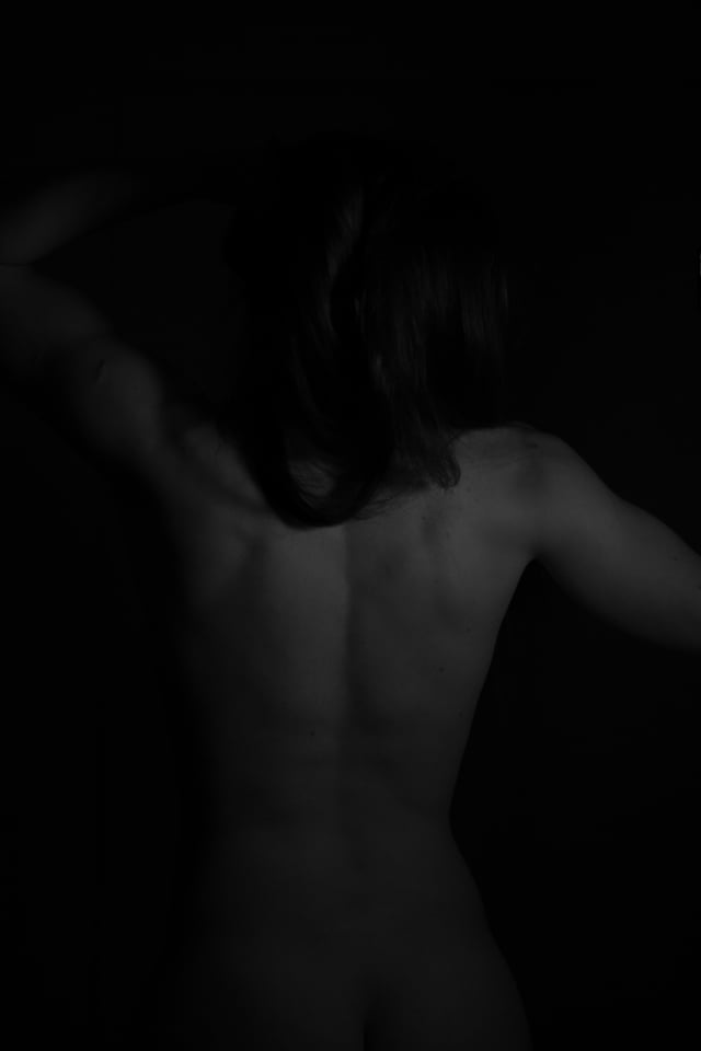 A year ago, my red light photoshoot which highlights the details and edges on the body. (Canon m50 - 35mm ~ f2.8 ~ 1/50 ~ 1600 ISO)