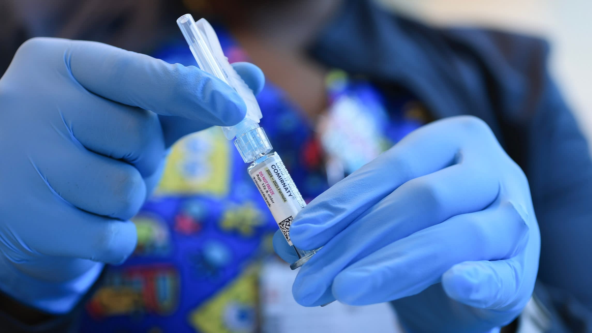 Pfizer shares dip as vaccines continue to weigh on sales