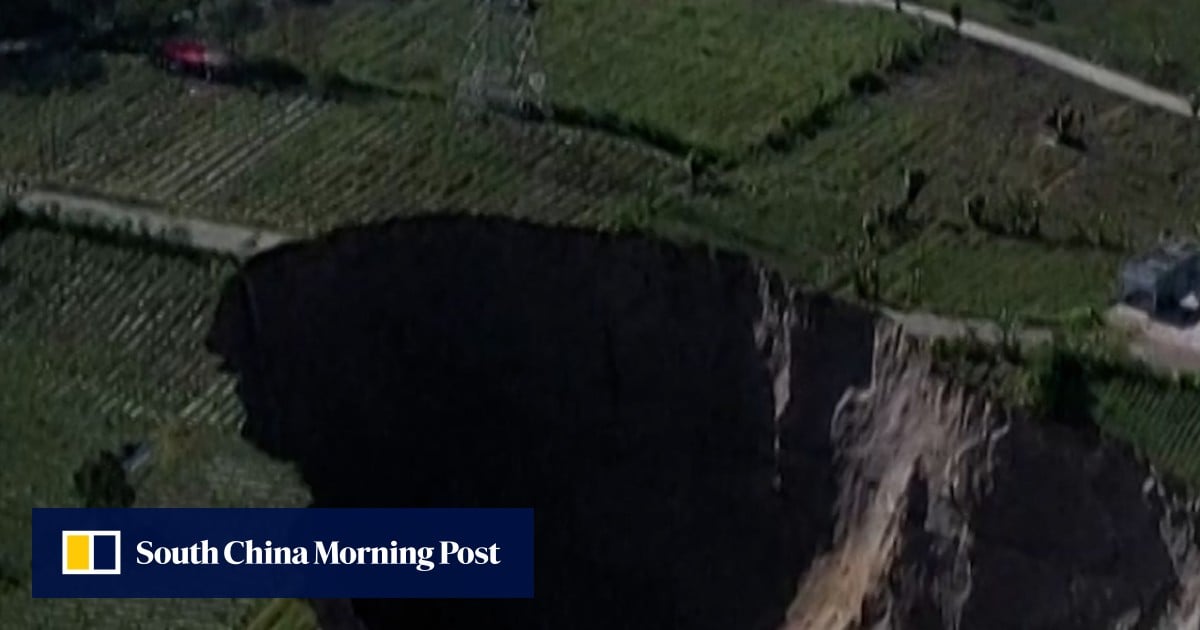Indonesian village at risk of being swallowed by 100-metre-deep sinkhole