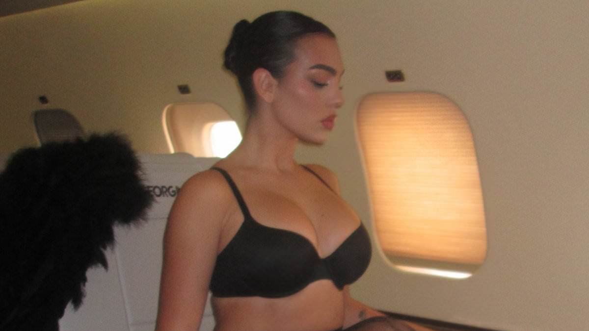 Georgina Rodríguez shows off her gorgeous curves in a black bra and sheer tights as she turns up the heat for sexy Milan Fashion Week snaps