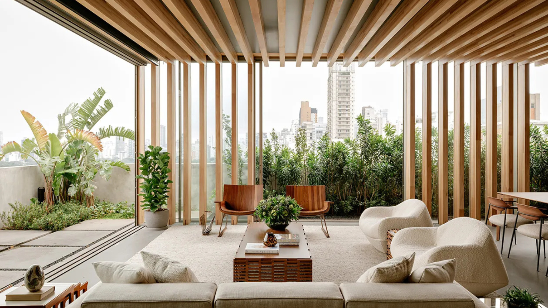 Step inside a tranquil, timber-wrapped São Paulo apartment that practically hovers above the city