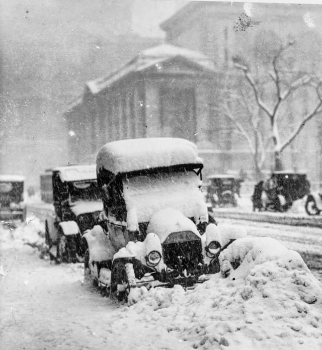 December 8, 1917. Looking at digging out your Car after the Street was Plowed in NYC