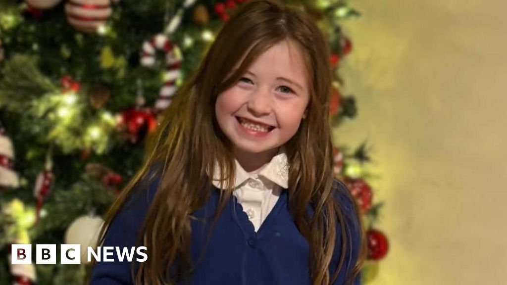 Woman arrested over death of girl found in pond